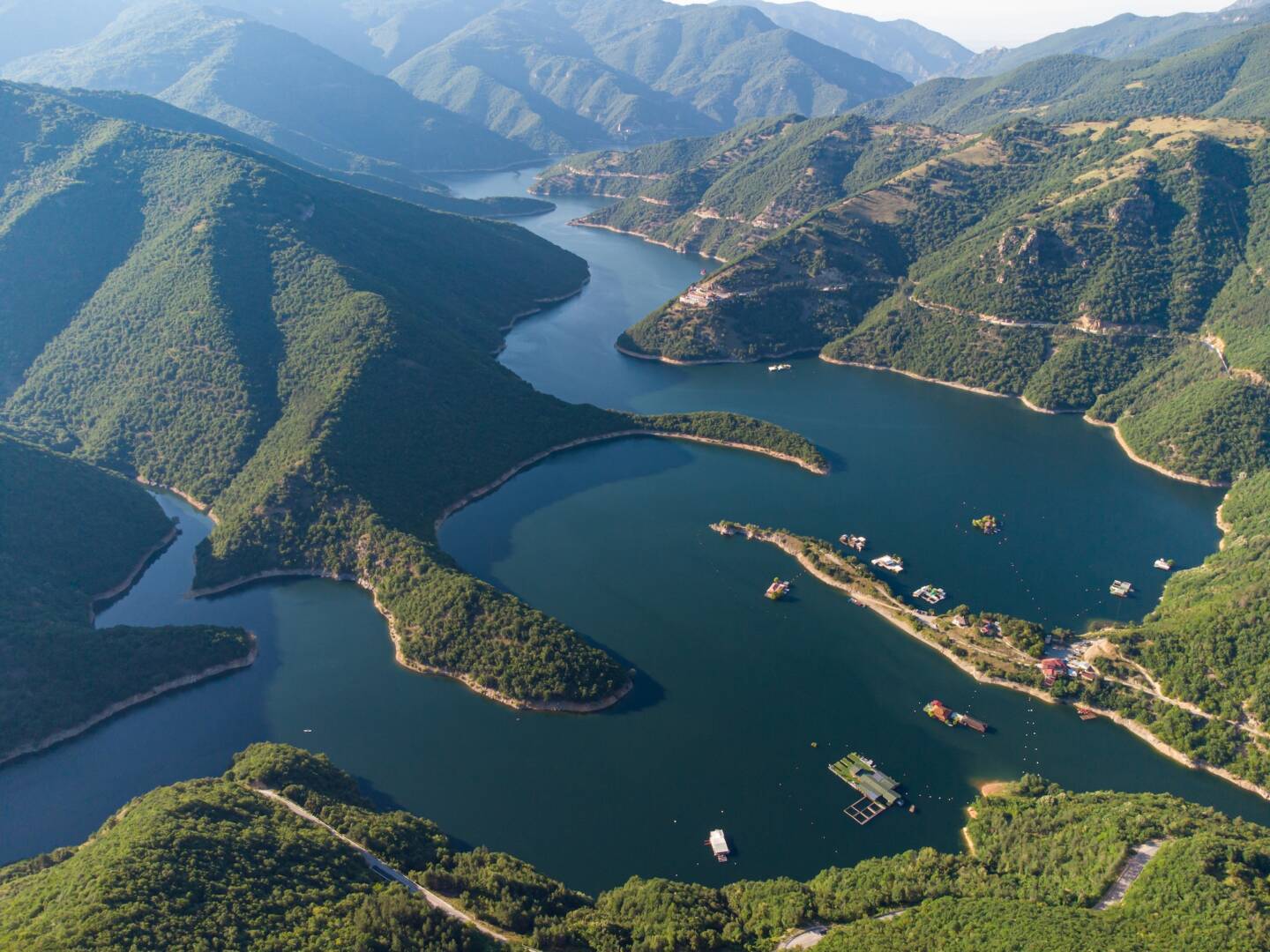 Aerial panoramic view of Vacha Reservoir located in Bulgaria near the Devin city, Rhodopa Mountains